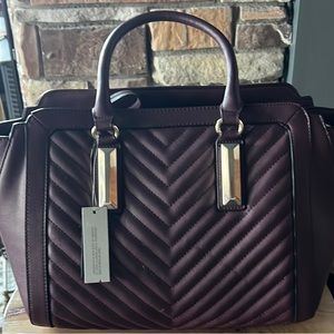 Plum color purse with zipper